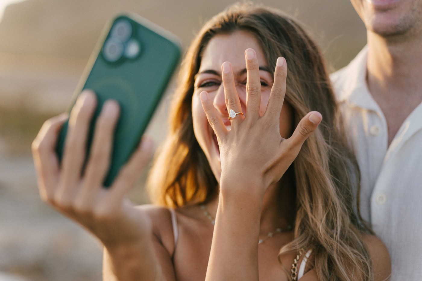 The phone held up, the ring in front of the camera