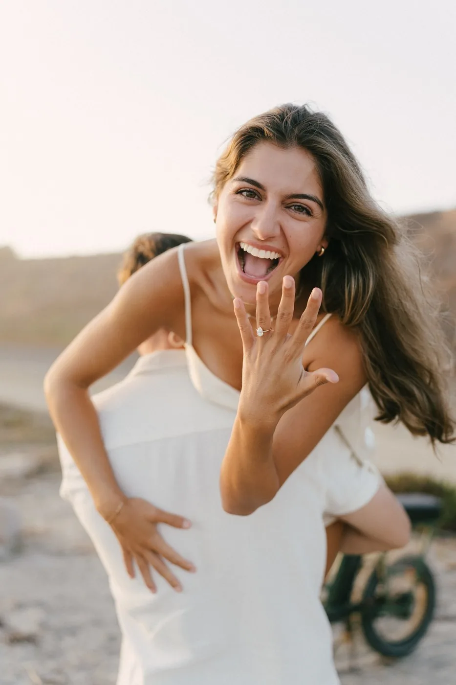 Sabrina showing the ring, running