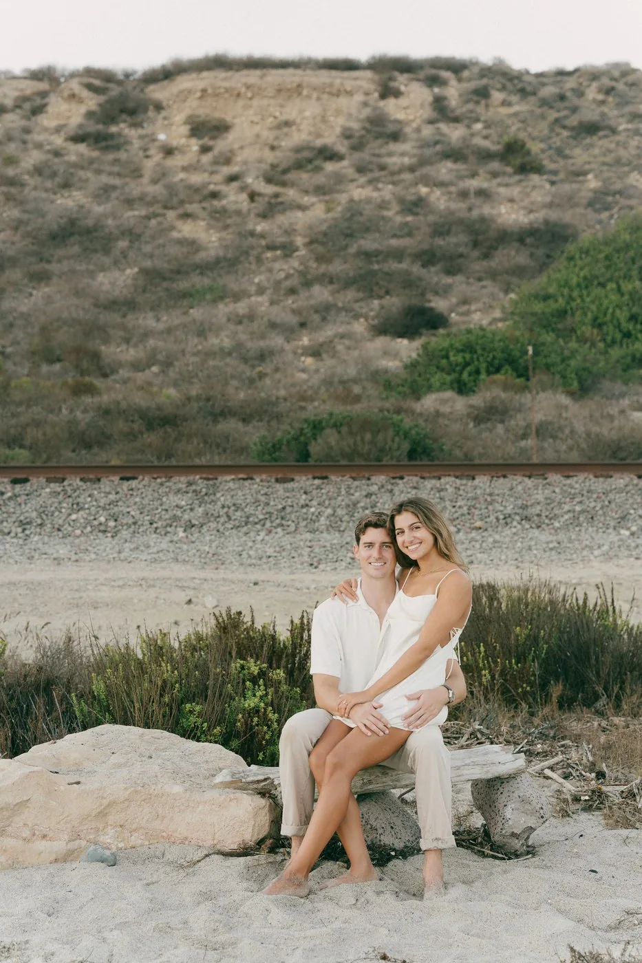 Sitting on the rocks below the railway
