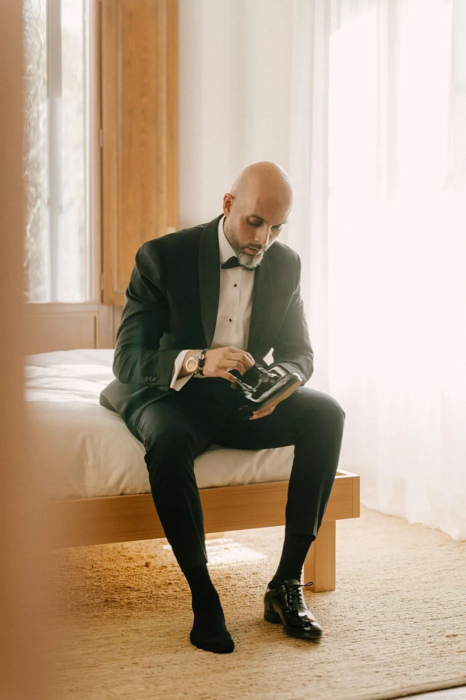 The groom, by the window