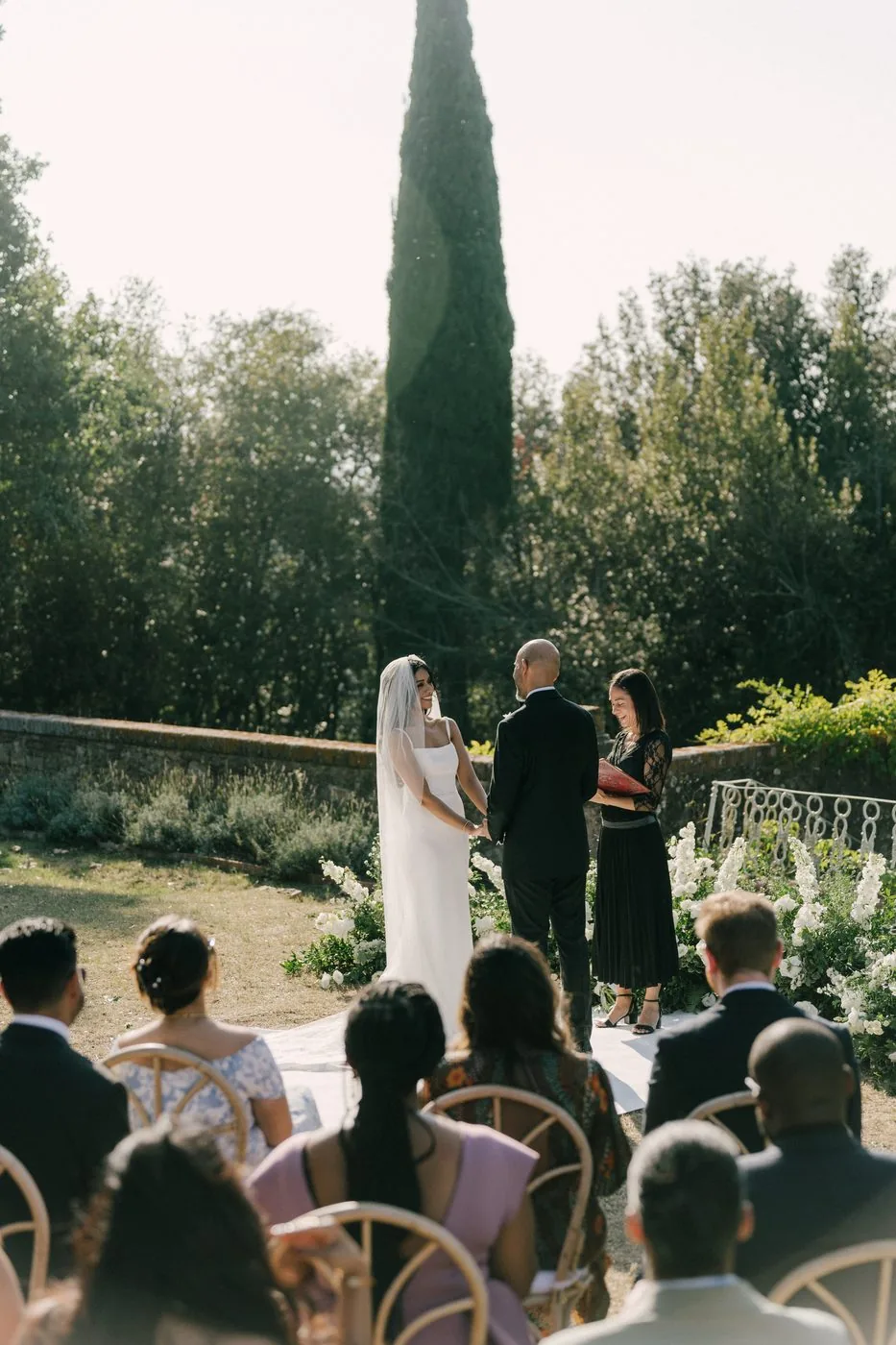 The vows, under the cypresses