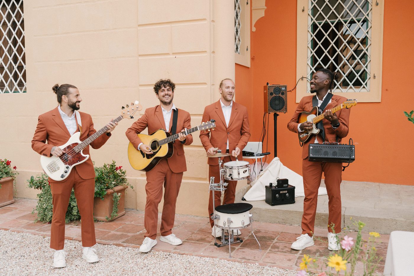 The band, in orange