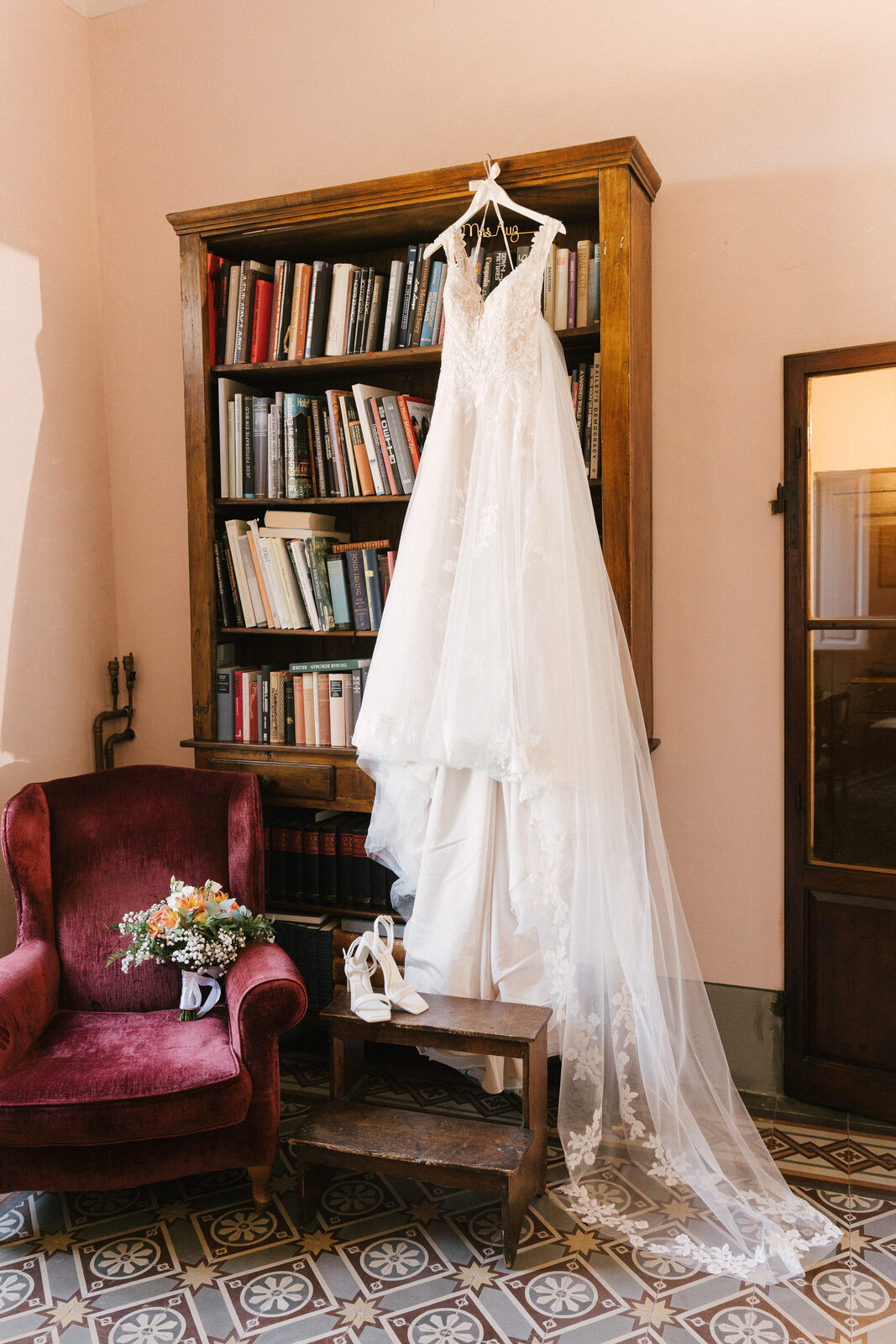 The dress, hanging in the library
