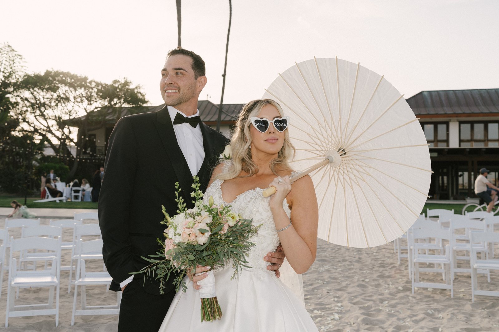 A paper parasol, on the sand