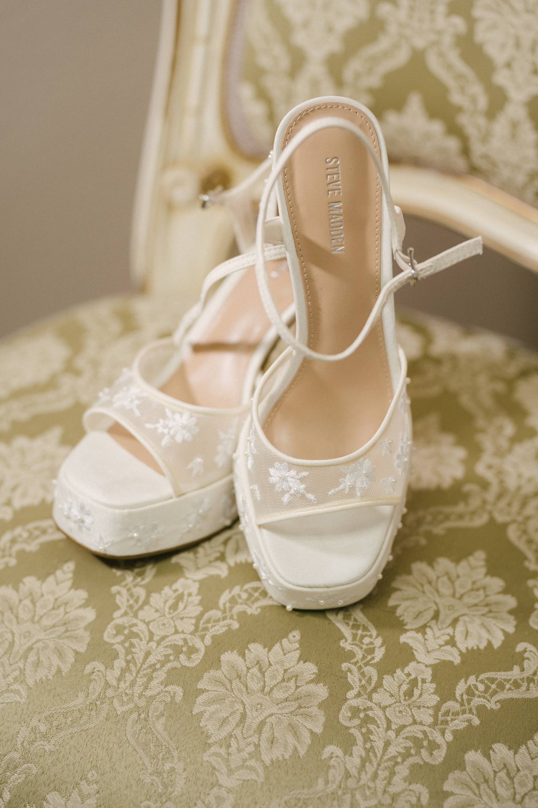 The shoes, on the damask