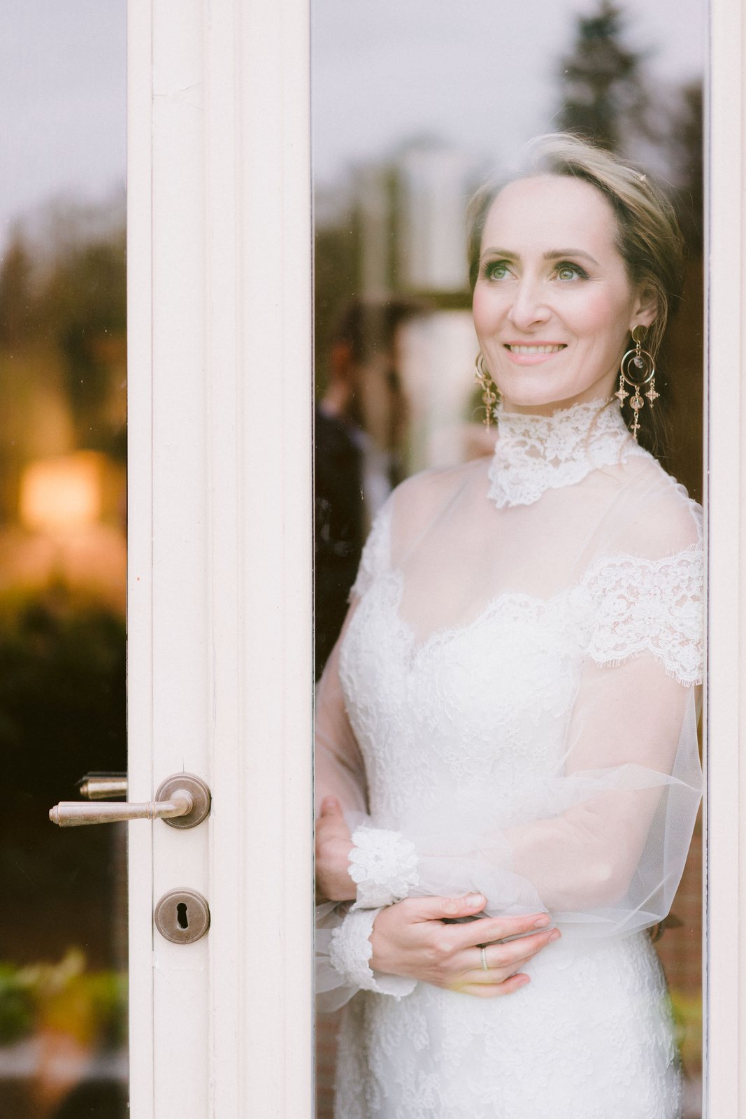 At the open door