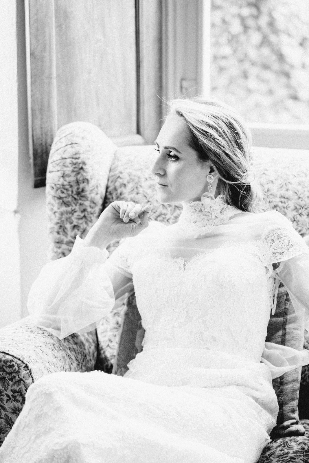 Seated, in black and white