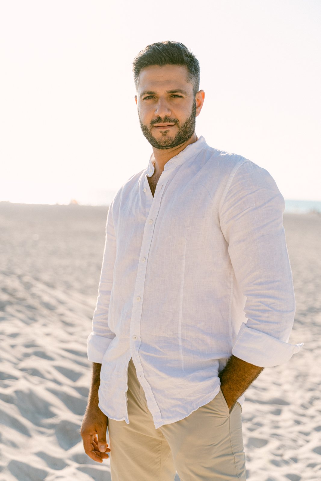 Him, on the sand
