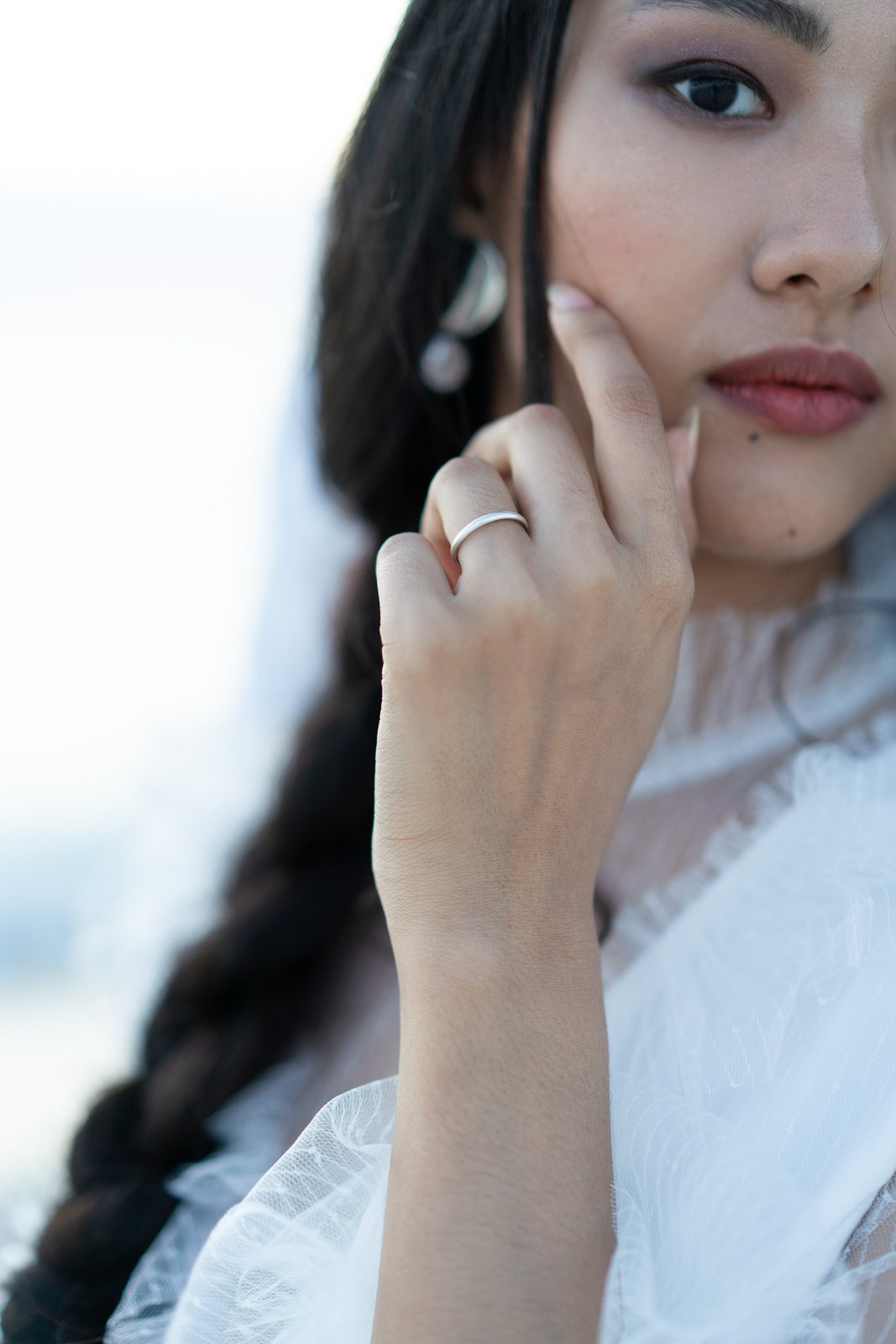 A hand, and a ring — before the preset