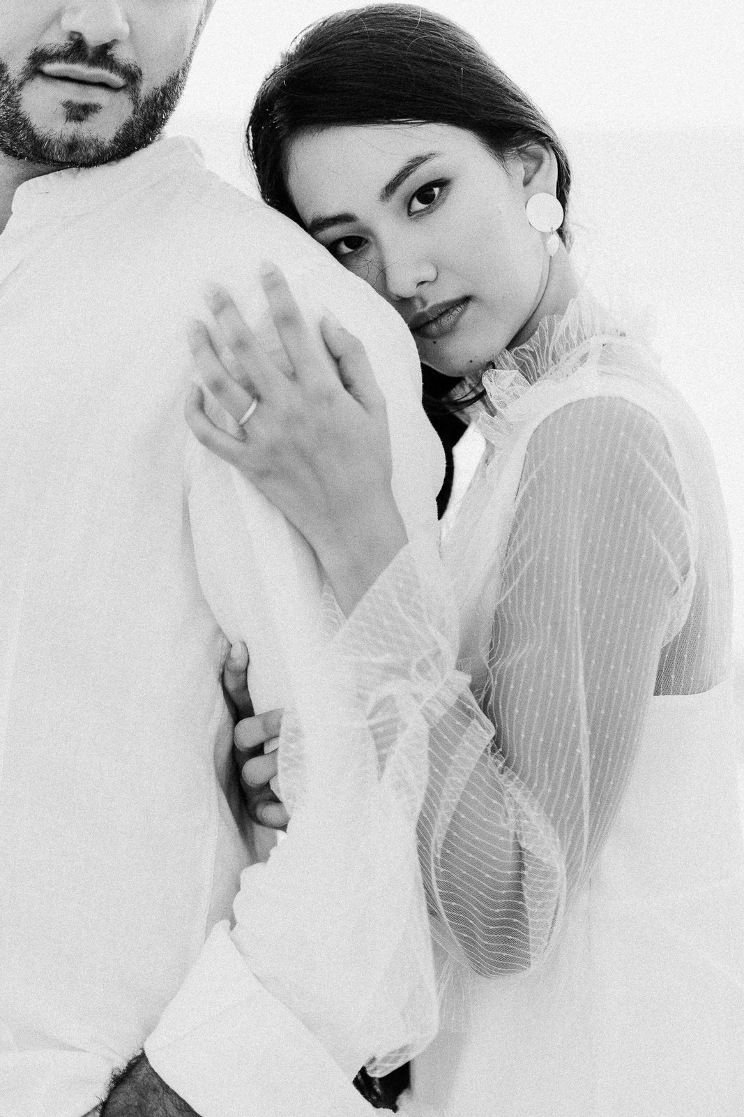 Two people, indoors — after the preset
