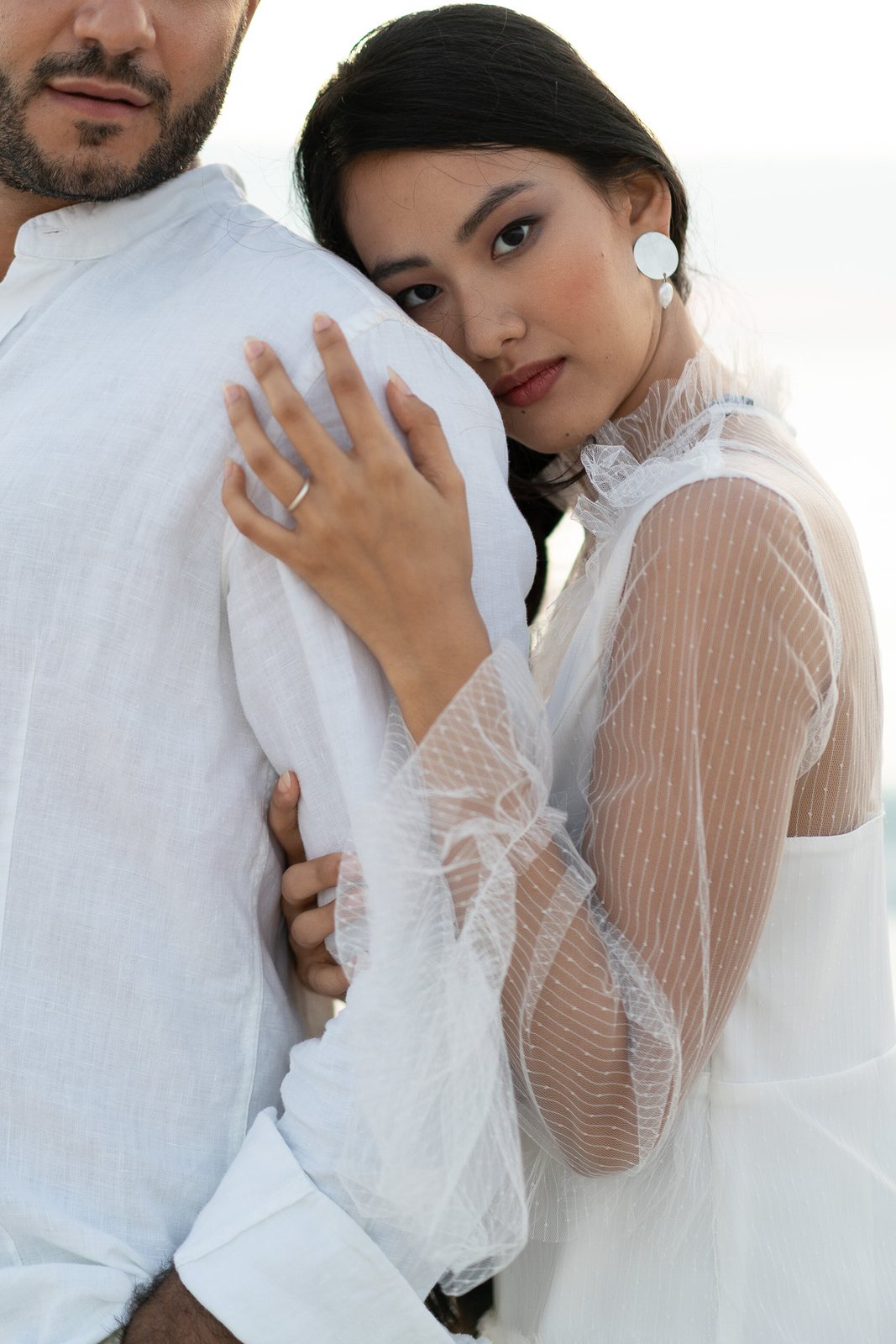 Two people, indoors — before the preset