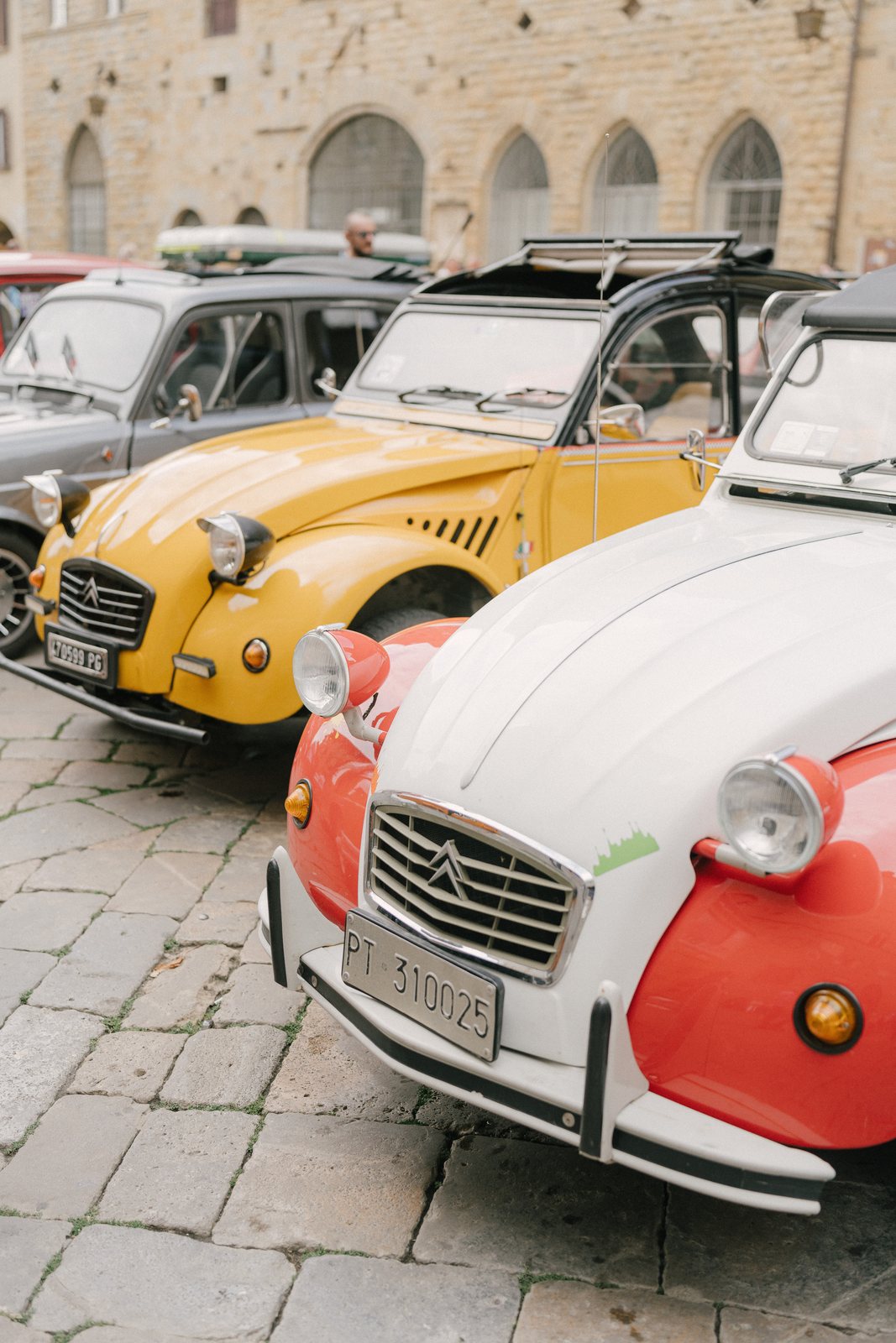 The cars, waiting in the square