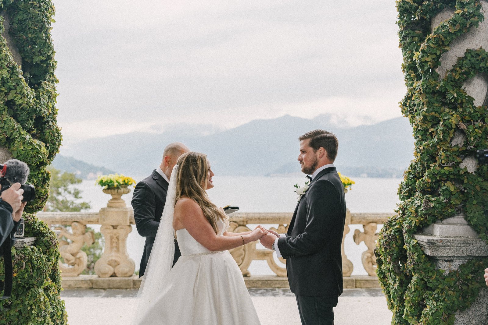 A ceremony on the terrace with the lake behind, Villa del Balbianello