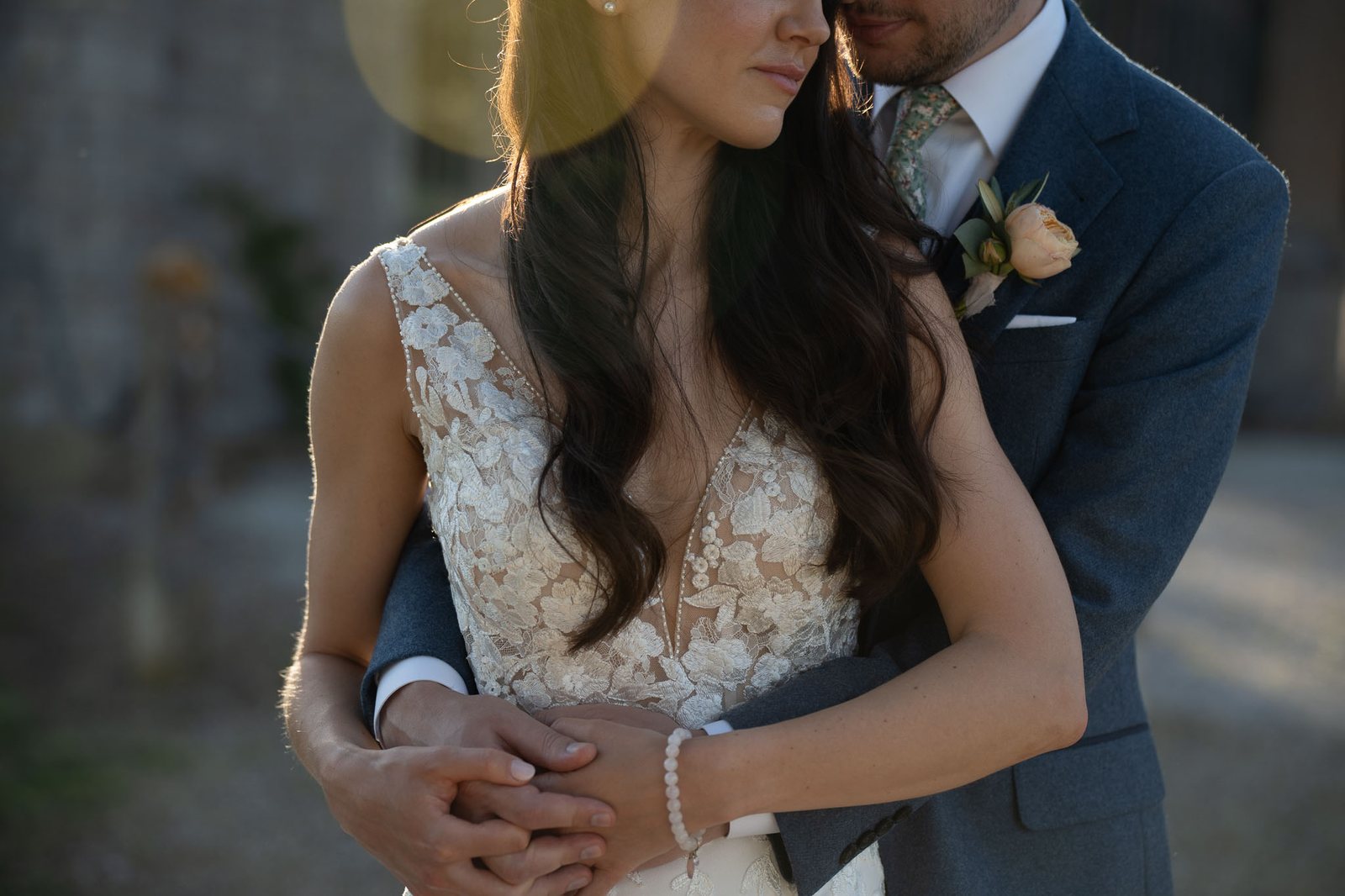 A couple in late afternoon light — before the preset