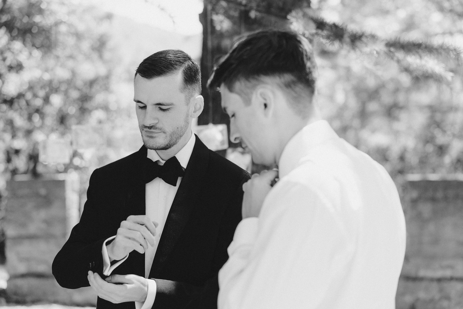 The groom, in black and white