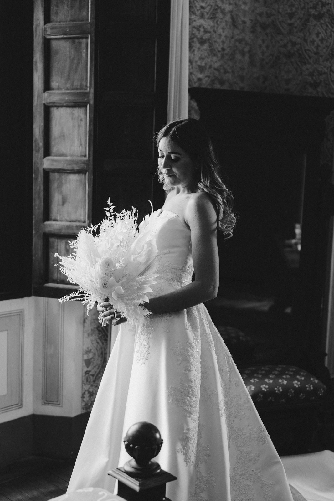 At the door, in black and white