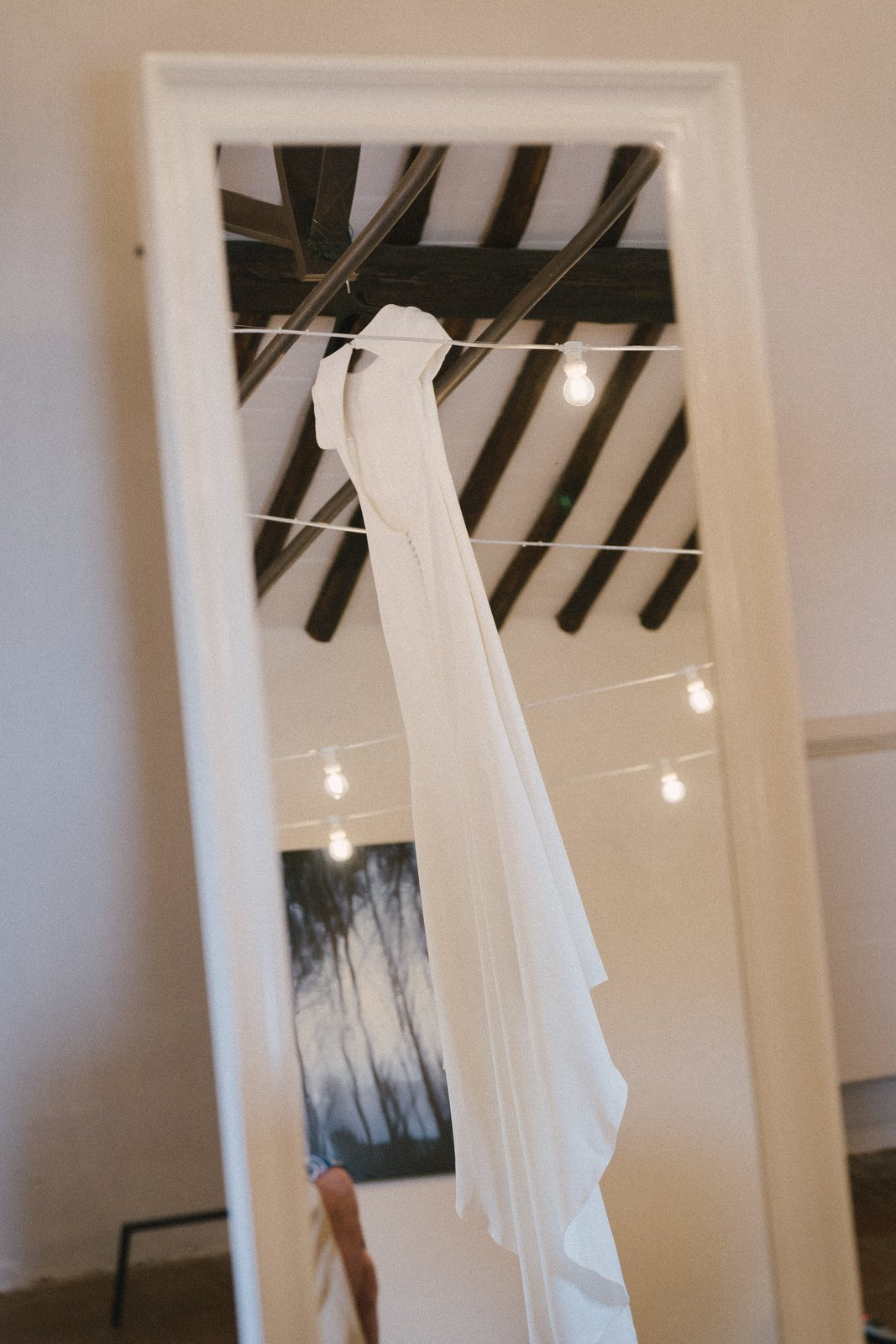 The dress, in the mirror