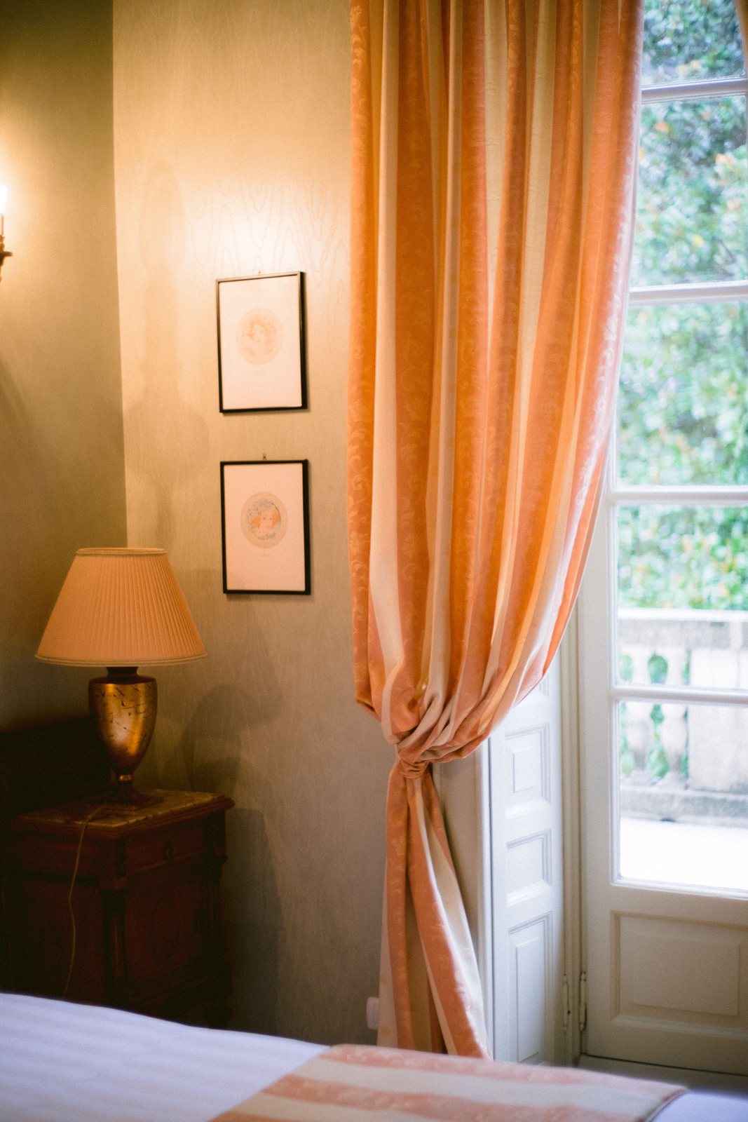 The room with the orange curtains