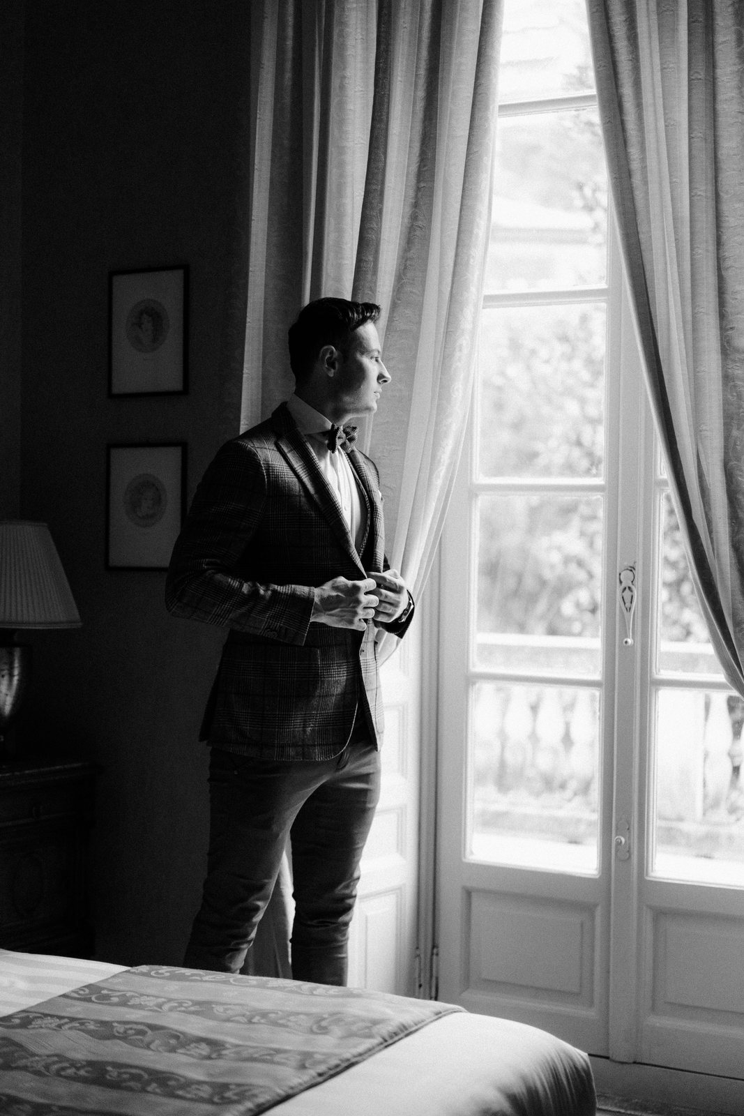 Him, at the window
