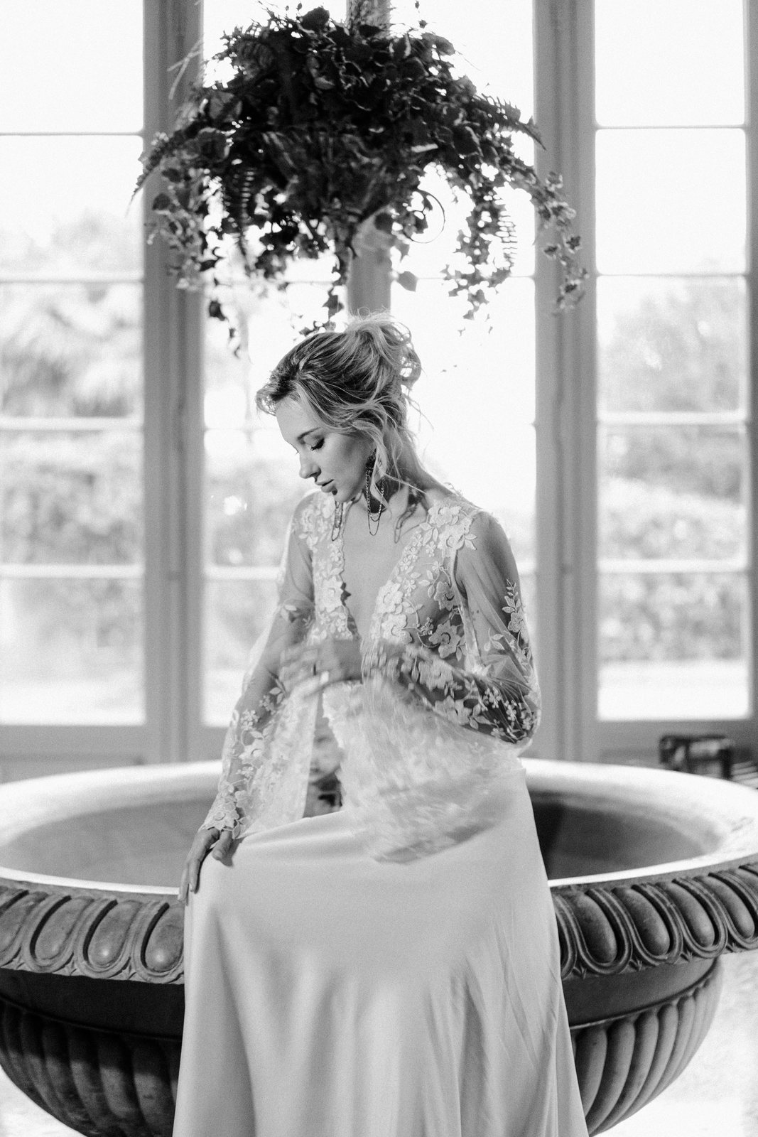 By the urn, in black and white