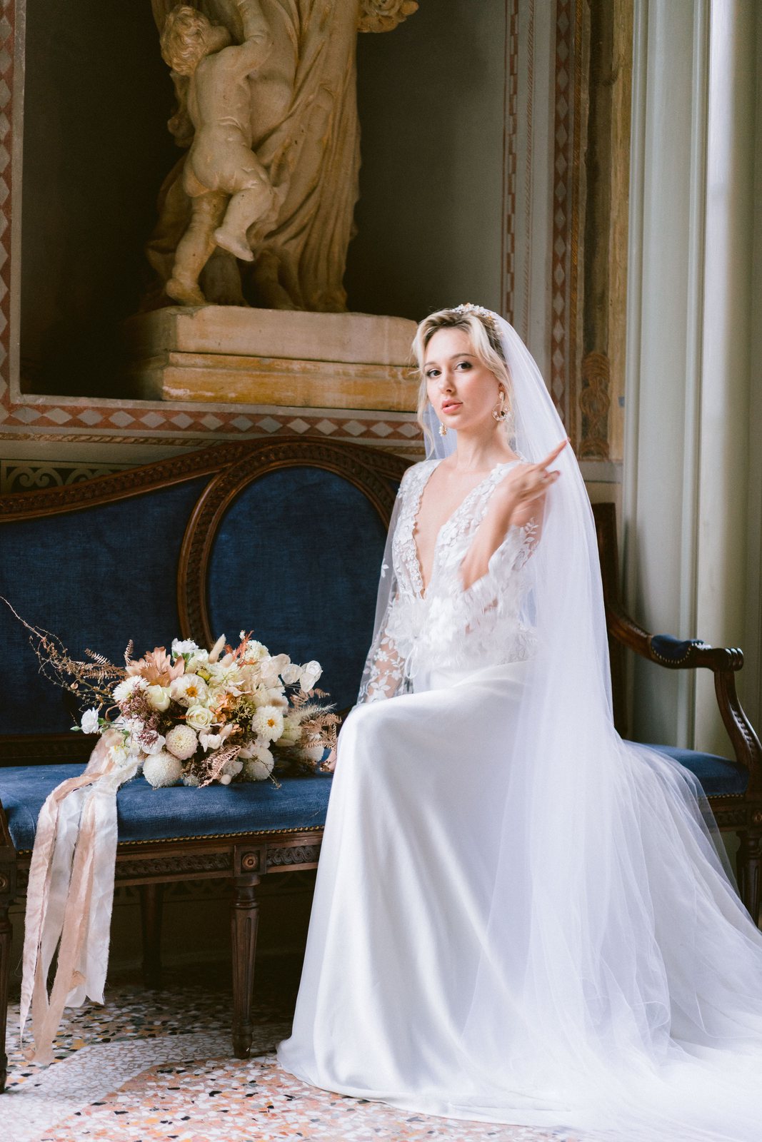Seated, with the veil