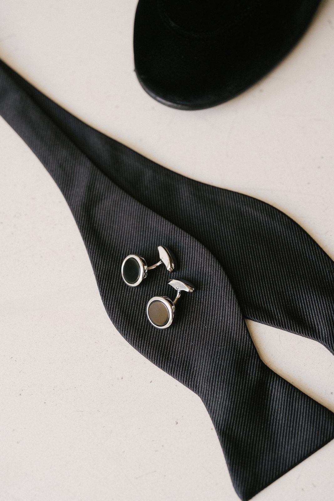 His cufflinks